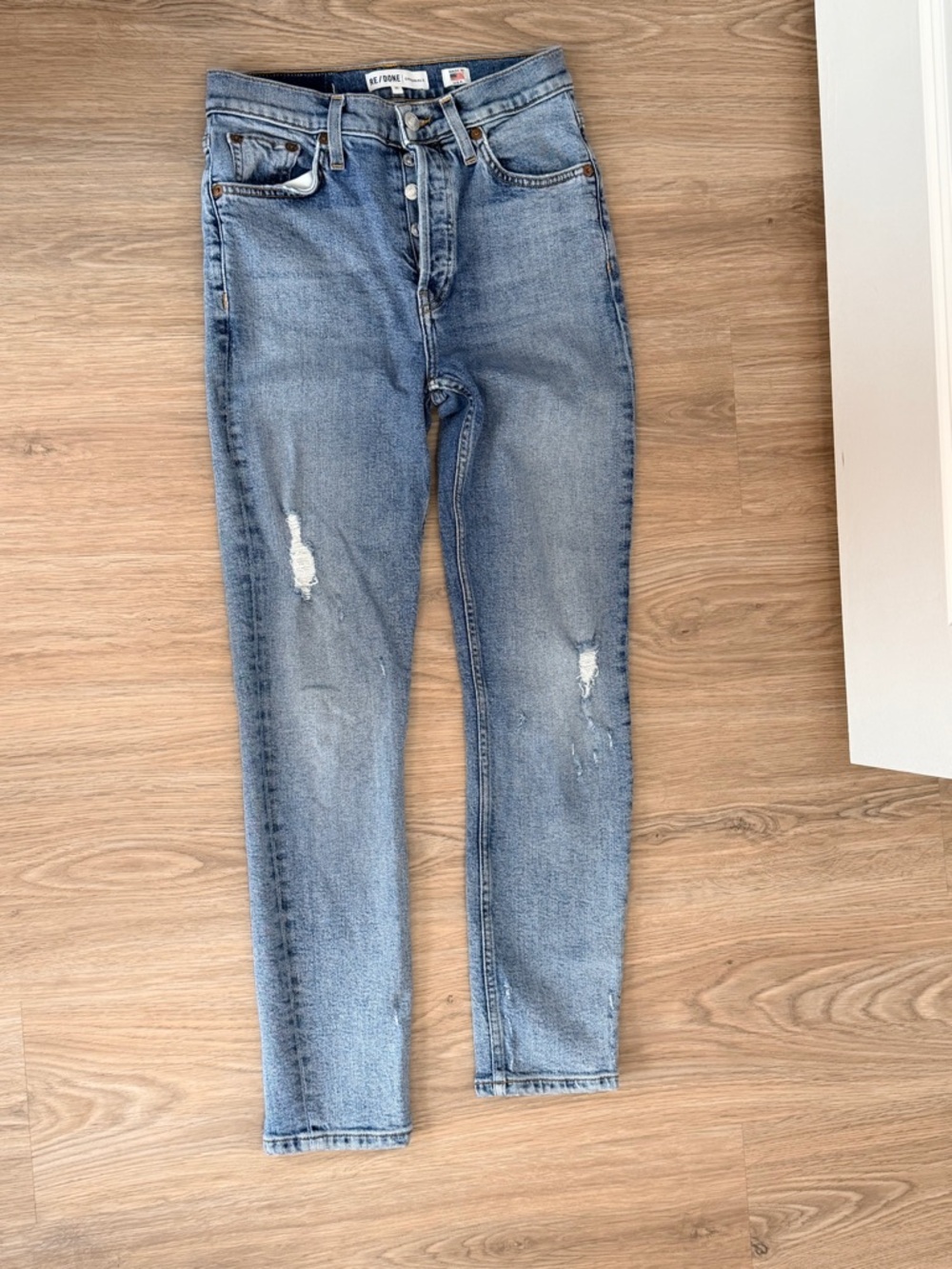 Re/Done Light Wash High-Rise Skinny Jeans with Knee Distress